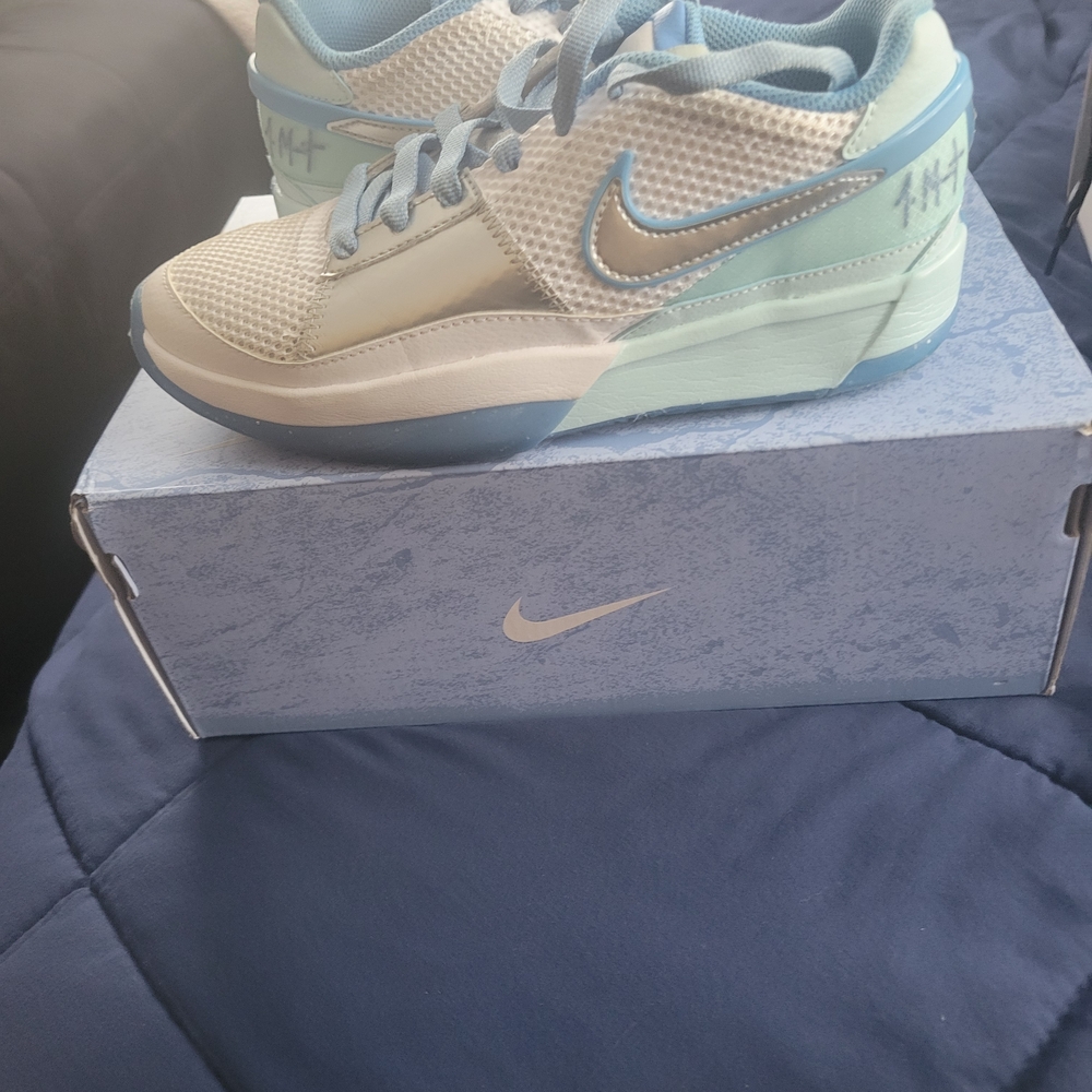 JA 1'S Nike Kids' Sneakers in Light Blue and SLIVER WORN WAS ONLY AT INDOOR GYMS